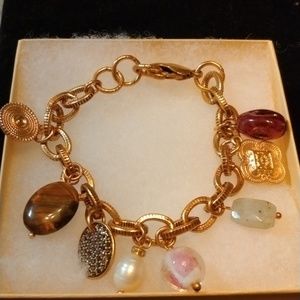 Vintage charm bracelet with beads and charms